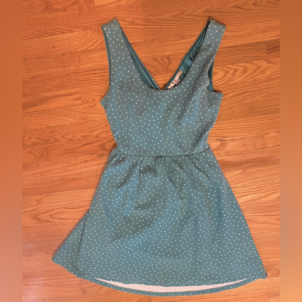 Large Lauren Conrad dress with cutout detail on back